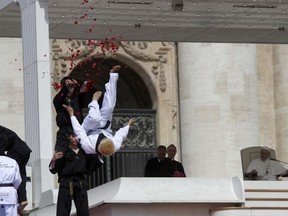 Taekwondo athlethes from South Korea perform for Pope Francis during his weekly general audience in St. Peter's Square, at the Vatican, Wednesday, May 30, 2018.