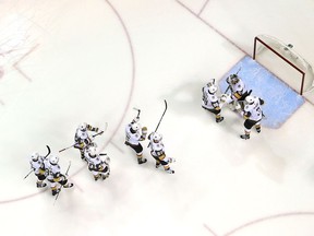 Vegas Golden Knights players celebrate their second-round playoff series win over the San Jose Sharks on May 6.