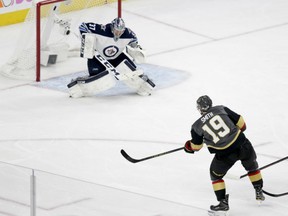 Reilly Smith of the Vegas Golden Knights rifles what proves to be the game-winning goal over the right shoulder of Winnipeg Jets' goaltender Connor Hellebuyck during Game 4 action in their Western Conference final Friday night in Vegas. The Golden Knights were 3-2 winners to go up 3-1 in the series with Game 5 Sunday in Winnipeg.