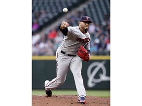 Minnesota Twins starting pitcher Fernando Romero throws to a Seattle Mariners batter during the first inning of a baseball game Friday, May 25, 2018, in Seattle.