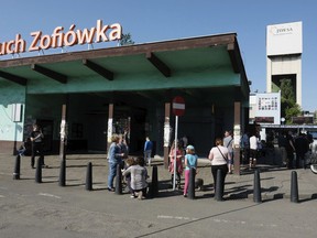 Families waiting for a word about miners who have gone missing after a tremor at the Zofiowka coal mine in Jastrzebie-Zdroj in southern Poland, on Saturday, May 5 , 2018. Seven miners went missing after the strongest ever tremor at the mine. Two of them were found hours later conscious but hurt, while rescuers continued their search for the other five missing miners.