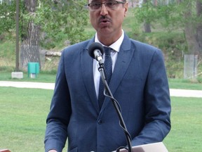 Federal Infrastructure Minister Amarjeet Sohi announces a $2-billion disaster fund on Thursday, May 17, 2018 in front of the Elcow River and Calgary Saddledome, which were hit by floods in 2013.