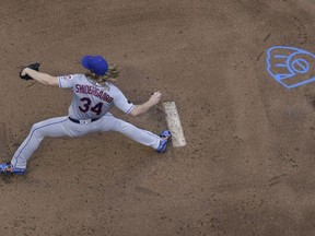 New York Mets starting pitcher Noah Syndergaard throws during the first inning of a baseball game against the Milwaukee Brewers Friday, May 25, 2018, in Milwaukee.