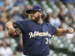 Milwaukee Brewers starting pitcher Wade Miley throws during the first inning of a baseball game against the Cleveland Indians Tuesday, May 8, 2018, in Milwaukee.