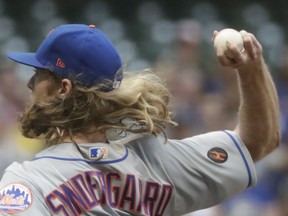 New York Mets starting pitcher Noah Syndergaard throws during the first inning of a baseball game against the Milwaukee Brewers Friday, May 25, 2018, in Milwaukee.
