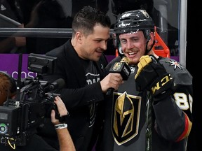 Vegas Golden Knights host Mark Shunock (left) interviews defenceman Nate Schmidt after the team's Game 4 win over the Winnipeg Jets on May 18.