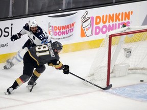 Vegas Golden Knights forward Jonathan Marchessault scores an empty-net goal in Game 3 against the Winnipeg Jets on May 16.
