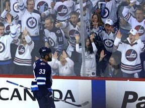 Winnipeg Jets defenceman Dustin Byfuglien celebrates one of his goals against the Nashville Predators on May 1.