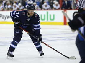 Winnipeg Jets defenceman Toby Enstrom lines up for a face-off against the Vegas Golden Knights on May 12.