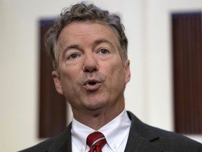 FILE - In this April 18, 2018, file photo, Sen. Rand Paul, R-Ky., speaks on Capitol Hill in Washington. On May 17, the Senate rejected an attempt by Paul to force a debate on sweeping budget cuts and federal deficits that are growing despite a strong economy. After last year's tax cuts and a two-year agreement on agency budget levels, Republicans controlling Congress aren't trying to pass a budget blueprint this year. There's no appetite to cut popular programs in such a difficult political environment.