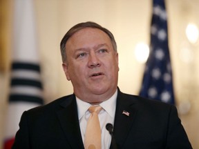 In this May 11, 2018 photo, Secretary of State Mike Pompeo speaks during a media availability with South Korean Foreign Minister Kang Kyung-wha at the State Department in Washington. In a pep talk to State Department employees on Wednesday, Pompeo said his repeated calls for the demoralized agency to regain its "swagger" means that American diplomats should act with confidence and aggressiveness "born of the righteous knowledge that our cause is just."