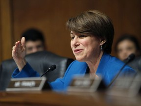 FILE - In this July 12, 2017, file photo, Sen. Amy Klobuchar, D-Minn. speaks during a hearing on Capitol Hill in Washington. The Senate gave swift, unanimous approval on May 24, 2018, to a bill that revamps the system for handling sexual harassment complaints on Capitol Hill. The bill eliminates mandatory waiting periods for handling claims and requires lawmakers to repay the Treasury for harassment settlements, and comes three months after the House unanimously passed its own version.