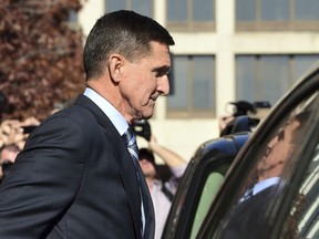 FILE - In this Dec. 1, 2017, file photo, former President Donald Trump national security adviser Michael Flynn leaves federal court in Washington. Robert Mueller charged former campaign chairman Paul Manafort with failing to register as a foreign agent despite being paid millions from a pro-Russian Ukrainian political party, and court papers show Flynn did undisclosed work directed in part by Turkish government officials. A federal case against a Pakistani man is putting Washington lobbyists on notice. The prosecution reflects what officials say is a more aggressive enforcement strategy against unregistered foreign agents that began before Robert Mueller's investigation laid bare a shadowy world of international influence peddling.