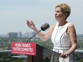 Ontario Liberal Leader Kathleen Wynne makes a transit announcement in Markham, Ont. on Wednesday, May 30, 2018. On the one end of the spectrum, you have Doug Ford — he’s expressed his admiration for (U.S. President) Donald Trump, despite the chaos, the uncertainty that the Trump administration has caused Ontario,” Wynne said.