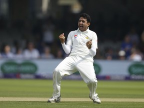 Pakistan's Mohammad Abbas celebrates after taking the wicket ofEngland's Jos Butler lbw during the fourth day of play of the first test cricket match between England and Pakistan at Lord's cricket ground in London, Sunday, May 27, 2018.