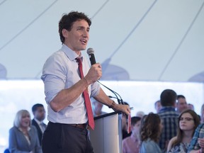 Prime Minister Justin Trudeau addresses the crowd at a Liberal fundraiser in Wolfville, N.S. on Thursday, May 31, 2018.