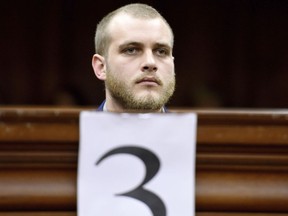 Henri van Breda sits in the High Court in Cape Town, South Africa, Monday May 21, 2018 as he awaits to hear the verdict in his case. Van Breda is accused of murdering three members of his family with an ax.