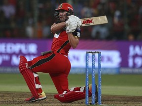 FILE - In this Thursday, May 17, 2018 file photo, Bangalore's Royal Challengers batsman AB de Villiers bats during the VIVO IPL Twenty20 cricket match against Sunrisers Hyderabad in Bangalore, India. De Villiers has retired from all international cricket that will keep him from having one more go at winning a World Cup with South Africa.