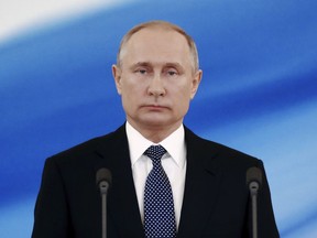 Vladimir Putin looks on during his inauguration ceremony for a new term as Russia's president in the Grand Kremlin Palace in Moscow, Russia, on Monday, May 7, 2018. Putin took the oath of office for his fourth term as Russian president on Monday and promised to pursue an economic agenda that would boost living standards across the country.