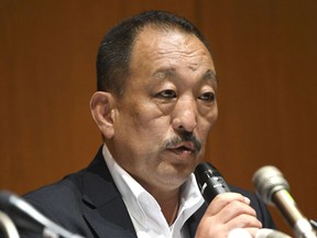 Kwansei Gakuin head coach Hideaki Toriuchi speaks during a press conference in Nishinomiya, western Japan Thursday, May 17, 2018. The head coach of Nihon University football team has denied instructing his players to commit fouls against opponents after footage of a controversial tackle went viral. In the video played widely on Japanese television, a Kwansei Gakuin quarterback is blindsided with a late hit by a Nihon University player in the May 6 game.