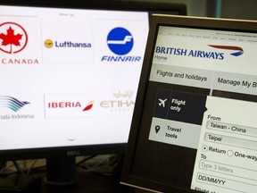 In this May 21, 2018, photo, a computer screens display the booking website of British Airways showing "Taiwan-China" in Beijing, China.  Global airlines are obeying Beijing's demands to refer to Taiwan explicitly as a part of China, despite the White House's call this month to stand firm against such "Orwellian nonsense."