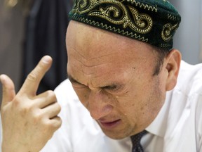 In this March 29, 2018, photo, Omir Bekali cries as he details the psychological stress endured while in a Chinese internment camp during an interview in Almaty, Kazakhstan. Since 2016, Chinese authorities in the heavily Muslim region of Xinjiang have ensnared tens, possibly hundreds of thousands of Muslim Chinese, and even foreign citizens, in mass internment camps. The program aims to rewire detainees' thinking and reshape their identities. Chinese officials say ideological changes are needed to fight Islamic extremism.