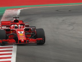 Ferrari driver Sebastian Vettel of Germany steers his car during the qualifying session for the Spanish Formula One Grand Prix at the Barcelona Catalunya racetrack in Montmelo, Spain, Saturday, May 12, 2018. The Spanish Formula One Grand Prix will take place on Sunday.