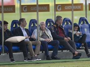 Brazil's former soccer player and manager Mario Zagallo, center, watches a practice session of the Brazilian national soccer team ahead the World Cup in Russia, at the Granja Comary training center in Teresopolis, Brazil, Thursday, May 24, 2018.
