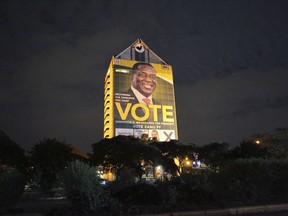 A portrait of Zimbabwe's new leader, Emmerson Mnangagwa is seen at the ruling party headquarters in Harare, Saturday, May, 5, 2018. The country's new President is rolling out new freedoms as never seen before in the country recovering from a 37 year grip of former leader Robert Mugabe.