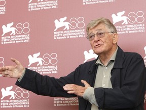 FILE - In this Tuesday, Sept. 6, 2011 file photo director  Ermanno Olmi poses for the photo call of the movie 'Il Villaggio di Cartone' at the 68th edition of the Venice Film Festival in Venice, Italy. Prize-winning Italian film director Ermanno Olmi has died Monday May 7, 2018 at the age of 86.