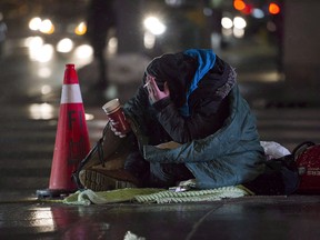 A homeless person is seen in downtown Toronto, on Wednesday, January 3, 2018. A cornerstone federal strategy to combat homelessness is set to receive a makeover this week that's expected to focus on outcomes, rather than how quickly cities are spending.