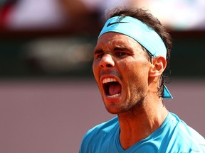 PARIS, FRANCE - JUNE 08:  Rafael Nadal of Spain celebrates during his mens singles semi-final match against Juan Martin Del Potro of Argentina during day thirteen of the 2018 French Open at Roland Garros on June 8, 2018 in Paris, France.
