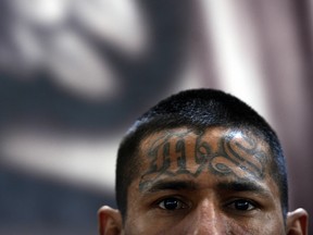 A member of the Mara Salvatrucha (MS13), is pictured on Monday, March 4, 2013, in the Criminal Center of Ciudad Barrios, San Miguel, 160 km east of San Salvador.