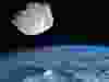 A composite of NASA images showing an asteroid high above Earth.