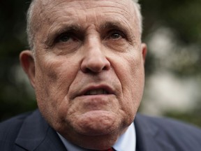 Rudy Giuliani, former New York City mayor and current lawyer for U.S. President Donald Trump, speaks to members of the media during a White House Sports and Fitness Day at the South Lawn of the White House May 30, 2018 in Washington, DC.