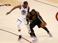 LeBron James of the Cleveland Cavaliers drives to the basket defended by Kevin Durant of the Golden State Warriors in the second half during Game 3 of the 2018 NBA Finals at Quicken Loans Arena on Wednesday in Cleveland.