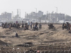 Palestinians protest by the Israel-Gaza border during long day of clashes with Israeli troops on June 8, 2018 in near Nahal Oz, Israel.