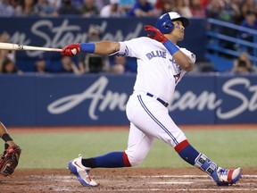 Yangervis Solarte of the Blue Jays hits a two-run home run in the seventh inning against the Washington Nationals during the game Friday night at Rogers Centre in Toronto.