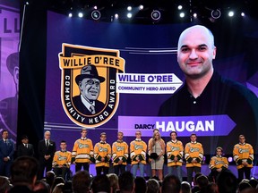 Christina Haugan accepts the Willie O'Ree Community Hero Awardher late husband Darcy Haugan who was the coach of the Humboldt Broncos onstage at the 2018 NHL Awards on June 20, 2018, in Las Vegas, Nevada.