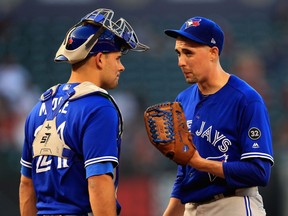 Toronto Blue Jays pitcher Aaron Sanchez (right) talks with catcher Luke Maile against the Los Angeles Angels on June 21.