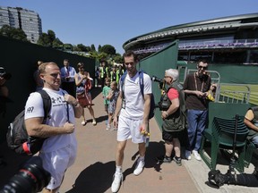 Andy Murray of Britain arrives for a practice session ahead of the Wimbledon Tennis Championships in London Saturday, June 30, 2018.