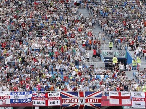 England flags are seen as fans watch the group G match between England and Panama at the 2018 soccer World Cup at the Nizhny Novgorod Stadium in Nizhny Novgorod , Russia, Sunday, June 24, 2018.
