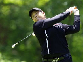 Ariya Jutanugarn, of Thailand, tees off on the second hole during the final round of the U.S. Women's Open golf tournament at Shoal Creek, Sunday, June 3, 2018, in Birmingham, Ala.