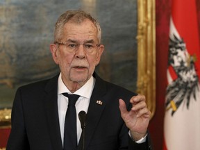 Austrian President Alexander van der Bellen addresses the media after talks with Slovak President Andrej Kiska at the Hofburg palace in Vienna, Austria. Austria demanded clarification from neighboring Germany on Saturday June 16, 2018 of reports that its spy agency snooped for several years on nearly 2,000 targets in the Alpine nation, including companies and ministries.