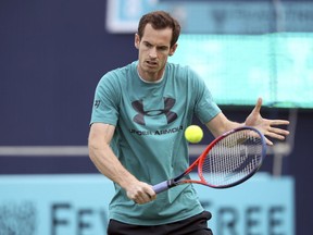 Britain's Andy Murray practices during a training session at the Queen's Club, in London, Friday June 15, 2018.