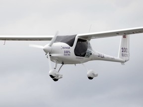 A view of the first flight by an electric aircraft, at Olso Airport, in Gardermoen, Norway, Monday,  June 18, 2018. Norway's transportation minister and the head of the Scandinavian country's airport operator took off Monday for a short flight ... aboard a small, Slovenian-made two-seater electric airplane. Dag Falk-Petersen, head of Avinor, sat at the commands of the white Pipistrel Alpha Electro G2 while Ketil Solvik-Olsen sat in the passenger seat when they took off from a remote corner of the Oslo airport for a brief journey in the grey skies.