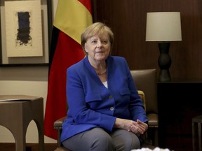 CORRECTION: CORRECTS NAME OF KING TO ABDULLAH II -- German Chancellor Angela Merkel meets Jordan's King Abdullah II at the Royal Palace in Amman, Jordan, Thursday, June 21, 2018. German Chancellor Angela Merkel on Thursday visited Jordan, a major refugee host country, amid an escalating domestic conflict over migration that has shaken her coalition government.