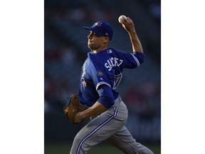Toronto Blue Jays starting pitcher Aaron Sanchez throws to the plate during the first inning of a baseball game against the Los Angeles Angels on Thursday, June 21, 2018, in Anaheim, Calif.
