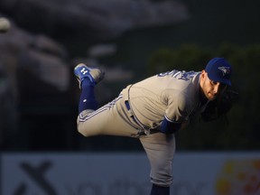 Toronto Blue Jays starting pitcher Marco Estrada throws to a Los Angeles Angels batter during the first inning of a baseball game Friday, June 22, 2018, in Anaheim, Calif.