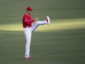 Los Angeles Angels starting pitcher Shohei Ohtani warms up before a baseball game in Anaheim, Calif., Wednesday, June 6, 2018.